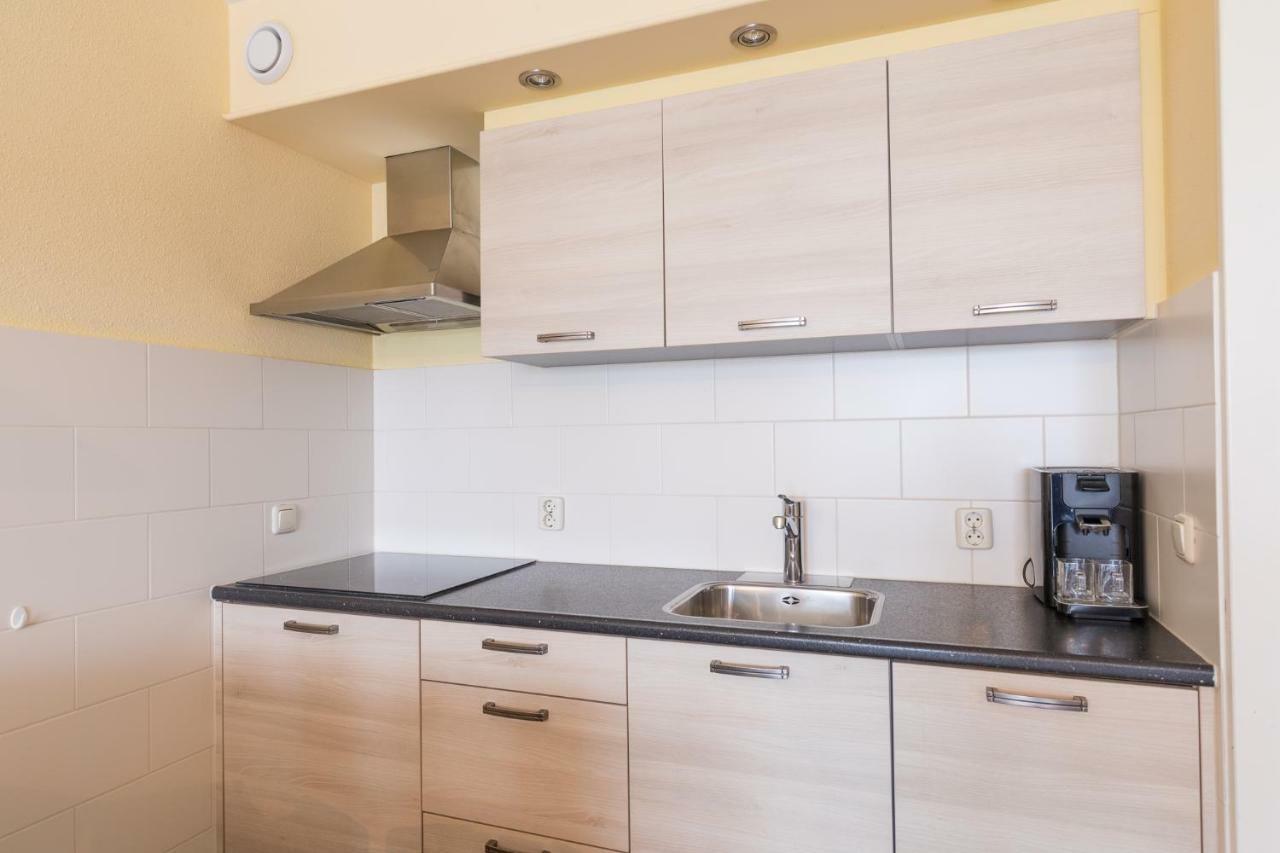Appartement De Vrijbuiter, Resort Amelander Kaap Холлум Экстерьер фото