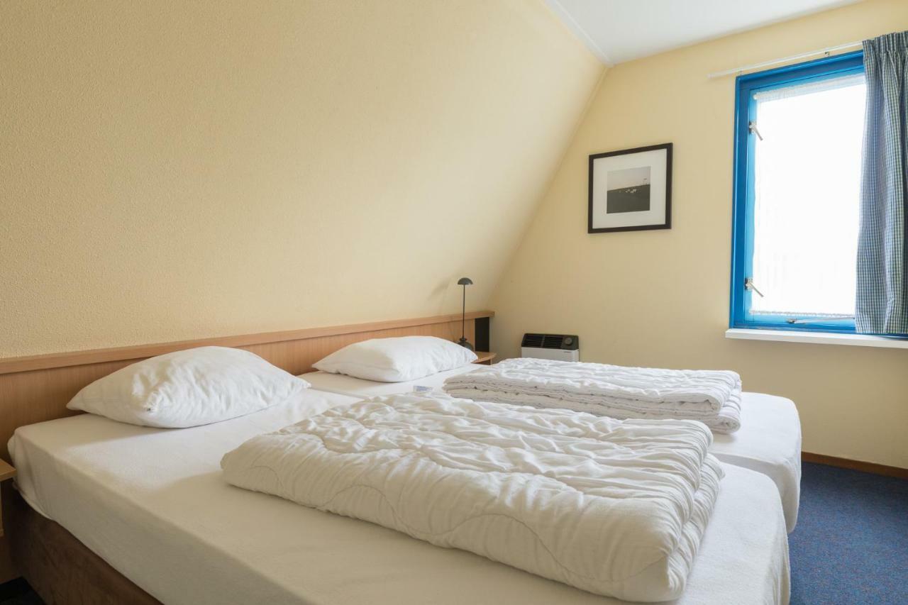 Appartement De Vrijbuiter, Resort Amelander Kaap Холлум Экстерьер фото